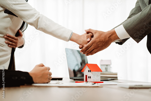 Real estate agents present model homes to clients, arrange mortgage loan agreements, and handle home purchase agreements. (Context: Concepts related to home mortgage loans.)