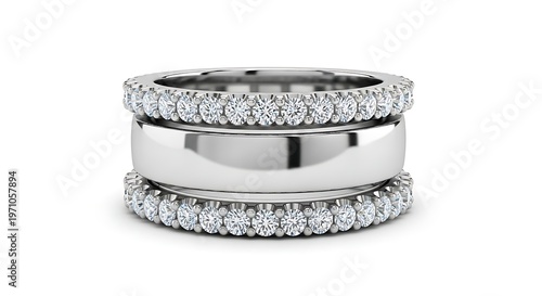 Two silver rings with diamonds stacked on top of each other