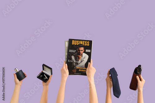 Young women holding men's t...