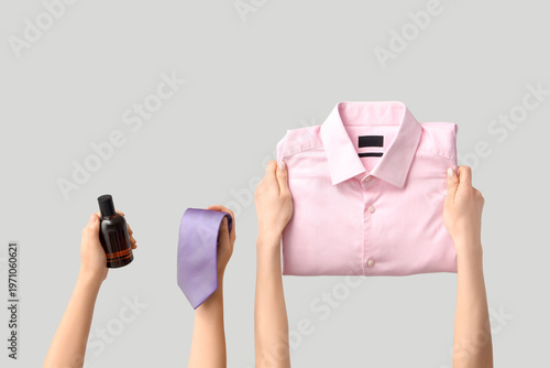 Young women holding bottle ...