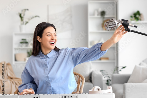 Young woman with microphone...