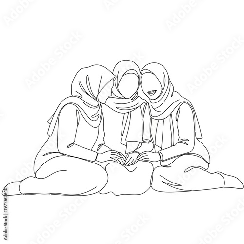 Three women wearing headscarves sitting together.