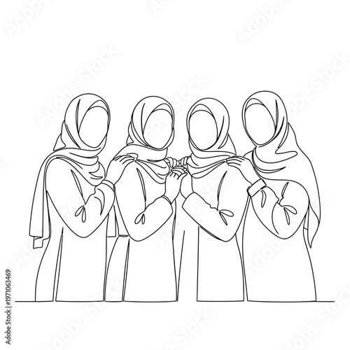 Four women wearing headscarves standing together.