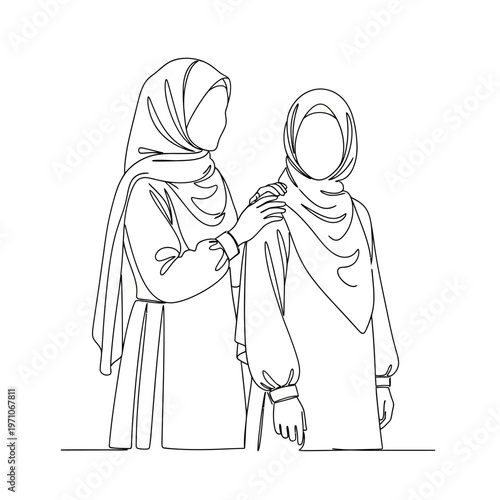 Two women wearing hijab headscarves together.