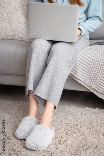 Young woman in soft slipper...