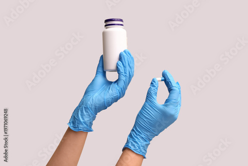 Hands of doctor in medical ...