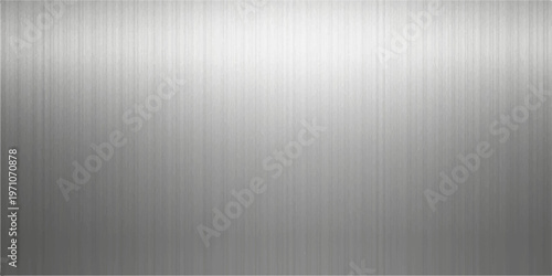 A shiny brushed metal plate featuring a grey stainless steel texture with a light reflective pattern on a metallic silver aluminum surface