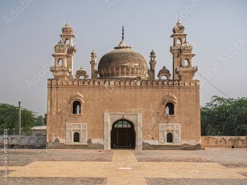 Landscape view of entrance gate or portal to mughal style Abbasi mosque outside Derawar fort, Cholistan desert, Bahawalpur, Punjab, Pakistan