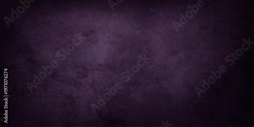 An empty dark blue grunge concrete wall texture with an aged purple pattern provides a vintage blank backdrop for a dirty black chalkboard design on an old textured surface material