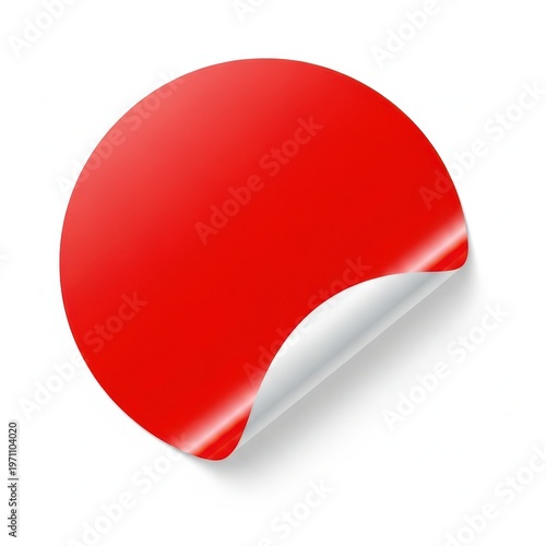 A red sticker with a curled corner on a white background.