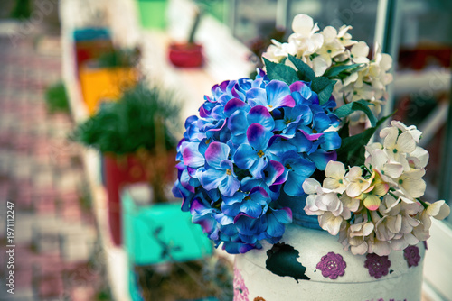 Blue And White Hydrangea Flowers In Decorative Vase