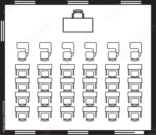 An overhead view of an empty classroom. The arrangement of tables and chairs, the teacher's desk at the front, create a sense of anticipation and the promise of learning.