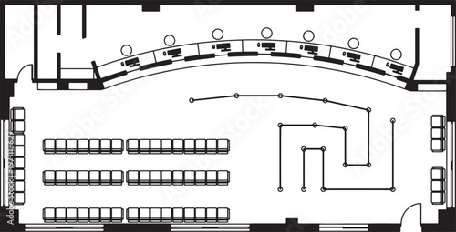 A top-down view of an architectural blueprint reveals a detailed layout. A meticulously rendered design of an office, complete with rows of seating, individual workstations.