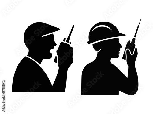 Two silhouetted figures communicate using handheld radios representing teamwork and coordination
