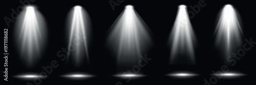 Five bright spotlights shine down, creating illuminated circles on a dark stage. Spotlights in a row, casting focused beams. Bright spotlights on a dark background. Overlay effect vector element set.