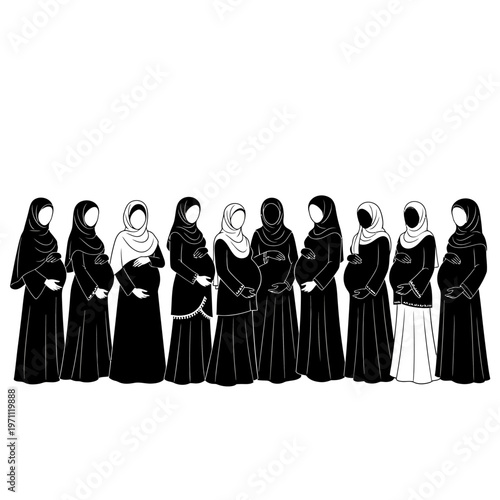 Women wearing black abayas standing together.