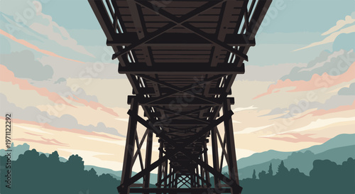 Underneath a wooden railway bridge at dusk, with clouds and mountains