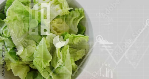 Cloud data entering from right, animating HUD charts over bowl of lettuce, showing food metrics