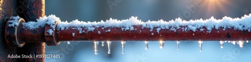 Tiny icicles cling to a rusty pipe, winter frost , urban, winter