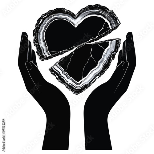Hands holding a broken heart made of agate stone with symbolizes heartbreak