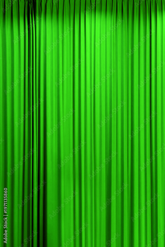 Fototapeta premium green theater curtain that dropped down as a straight line. Background for inserting text, empty spaces