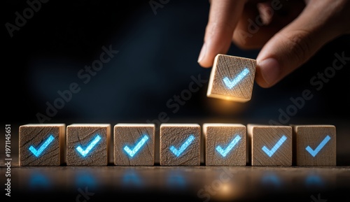 Wallpaper Mural Child's hand stacking small wooden blocks with glowing checkmark icons, illustrating success, approval, or achievement Torontodigital.ca