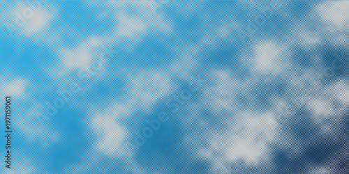 The bright blue sky with thin clouds forms an abstract pattern like gentle waves