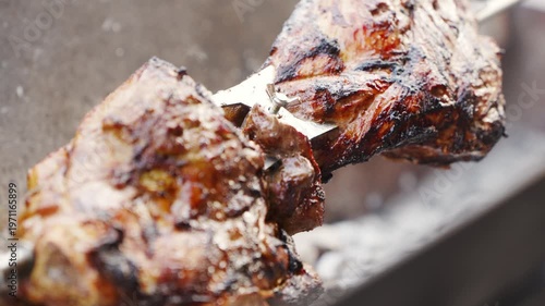 Enjoy street food with grilled meat skewers at the local market during the afternoon