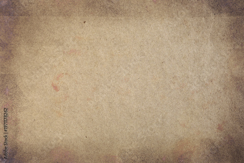 Old grunge vignette brown parchment paper texture