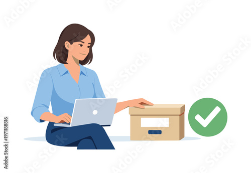 A professional maintaining digital organization in everyday work activities, seated with a laptop while interacting with a simple archive box and