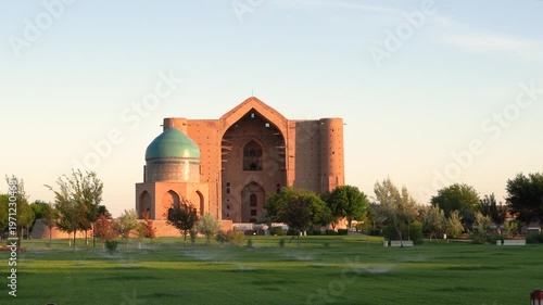 Turkestan, Kazakhstan - June 03, 2025: Scenic early morning sunrise view of the historical Mausoleum of Khoja Ahmed Yasawi (Қожа Ахмет Ясауи) and Rabia Sultan Begim Mausoleum complex 