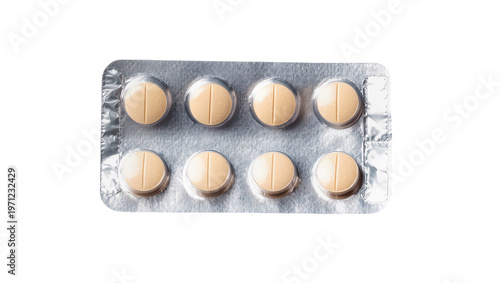 Round yellow tablets in blister pack with silver foil