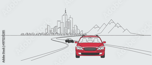 Red car driving on winding road between city and mountains