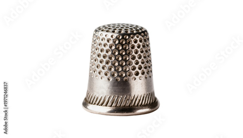 Bild auf Leinwand Vintage silver thimble with perforated pattern and ridged edge