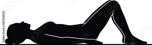 Woman performing a bridge exercise lying on her back with bent knees