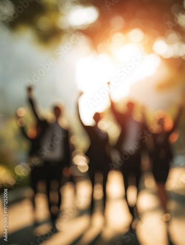 business team celebrating achievement with a blured background with naturel sunlightar 34
