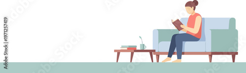 A woman relaxing on a couch in her living room, engrossed in a book, with a small table beside her holding more reading material, showcasing a peaceful moment of leisure and personal enjoyment