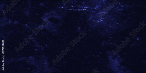 A dark abstract image of a galaxy, creating the sensation of outer space.