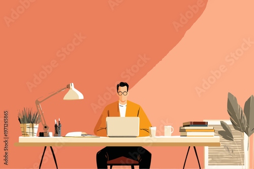 Young caucasian male working at desk with laptop in home office setting