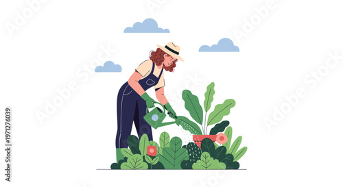 Dedicated female gardener in a hat and overalls waters lush green plants and flowers in a garden using a green watering can.