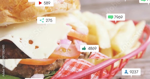 Notification bubbles appearing, multiplying and clustering over burger and fries, visualizing buzz