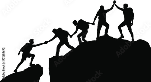 Silhouette of hikers helping each other climb a rocky mountain peak at dawn Keywords: silhouette, climbing, mountain, peak, hikers