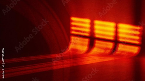 Photography Red cinematic light leak, abstract window shadow, warm glow on wall, mysterious