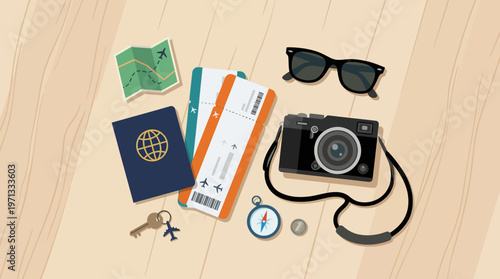 Travel essentials laid out on a wooden surface for a journey
