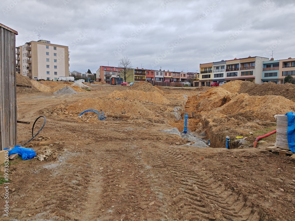 Obraz premium Underground water pipeline distribution system installed during residential housing development construction project