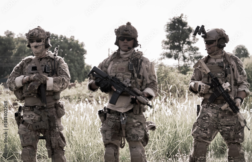 Fototapeta premium Military personnel in tactical gear on a mission-focused training exercise
