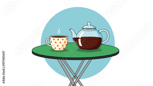 Glass teapot filled with dark tea next to a matching polka dot cup on a green garden table against a blue circular backdrop.