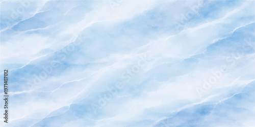 A beautiful clear blue summer sky filled with fluffy white clouds creates a bright sunny cloudscape and a peaceful view of the high atmosphere