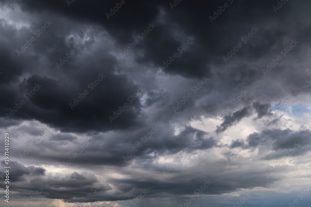 Fototapeta premium Stormy cloudy sky with dark rainy thunderstorm cumulus clouds background texture