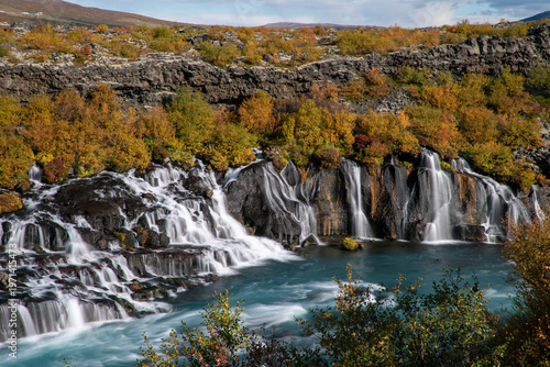 Hraunfoss waterfall Iceland long exposure autumn colors green foreground